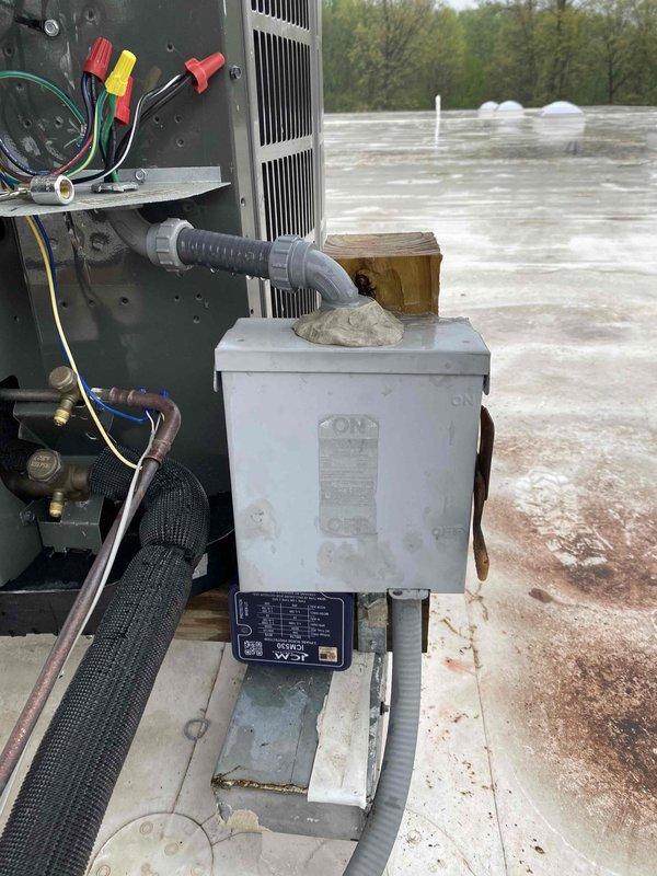 Returned to commercial rooftop location to complete installation of four surge protection devices on HVAC equipment as previously sold. Successfully installed surge protectors on multiple rooftop units, integrated devices into existing electrical disconnects and control circuits, verified proper wiring connections and grounding, and confirmed all units operational with surge protection active.