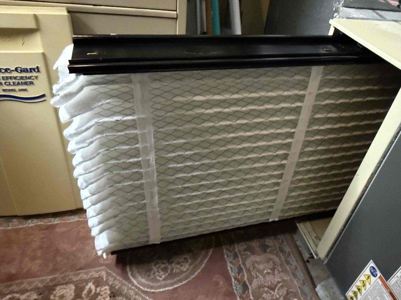 Completed standard HVAC tune-up service on residential system. Inspected exterior electrical service panel and conduit connections for proper clearances and potential safety concerns. Replaced air filter with new pleated media filter to ensure optimal airflow and system efficiency. Verified filter installation and confirmed system operation within normal parameters.