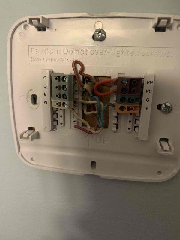 Responded to no-heat call on 9-year-old furnace where thermostat displayed "Heat On" but unit failed to ignite. Upon inspection, discovered loose wire connection at thermostat terminal block affecting the W (heat call) wire, preventing proper signal transmission to the furnace control board. Verified all thermostat wiring connections, re-secured terminals to manufacturer specifications, and tested system operation through multiple heating cycles. Furnace now ignites properly and responds correctly to thermostat heat calls.