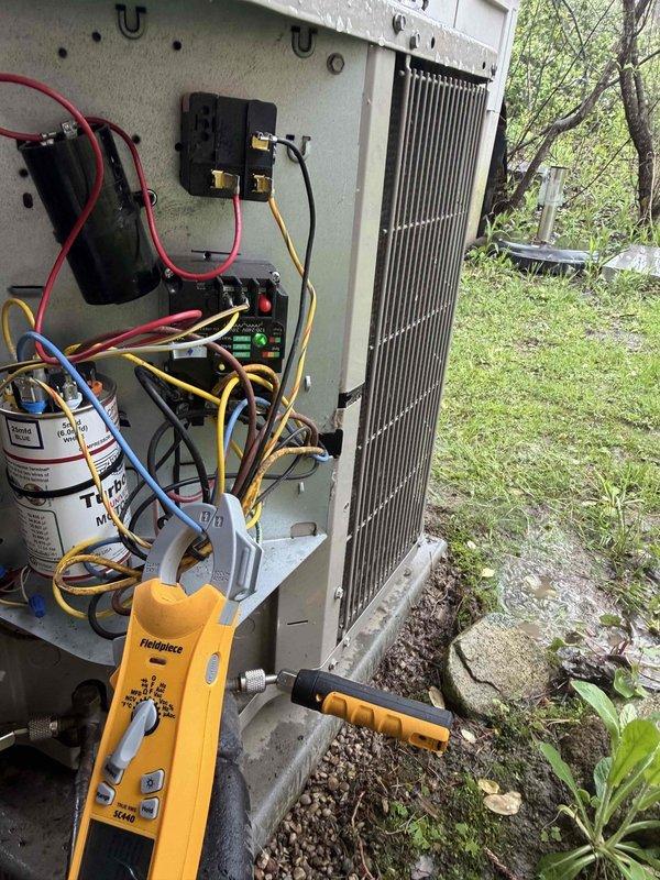 Completed cooling maintenance club visit on air handler system. Performed comprehensive inspection of outdoor condensing unit, including electrical component testing with diagnostic meter. Verified proper operation of contactor, dual capacitors, and associated wiring connections. Inspected condenser coil fins and overall unit condition. All components found operating within normal parameters and system running efficiently.