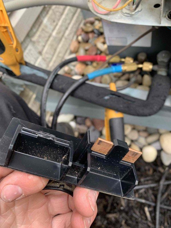 Completed cooling maintenance club visit on air handler unit. Performed electrical diagnostics using clamp meter, recording 45.5 amp draw on system components, and inspected electrical relay connectors for proper contact integrity and wear patterns.