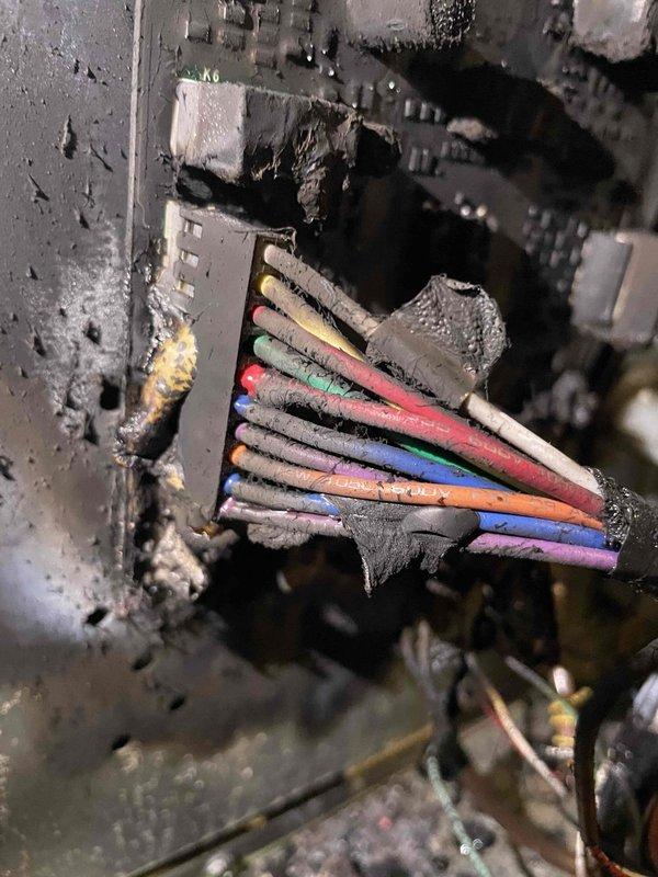 Responded to no heat call on furnace system. Upon arrival, found furnace and humidistat in off position with no power to units. Inspection of electrical control panel revealed catastrophic failure due to severe electrical fault resulting in extensive fire damage to control board, wiring harness, and panel enclosure. Multiple wire connections showed melted insulation, charring, and heat exposure throughout the affected area. Control relay and associated components exhibited burn damage with heavy soot accumulation on metal surfaces and wire bundles. System deemed unsafe for operation due to compromised electrical integrity and fire hazard. Recommended complete replacement of furnace unit given extent of internal damage to electrical components and potential compromise to other system elements not immediately visible.