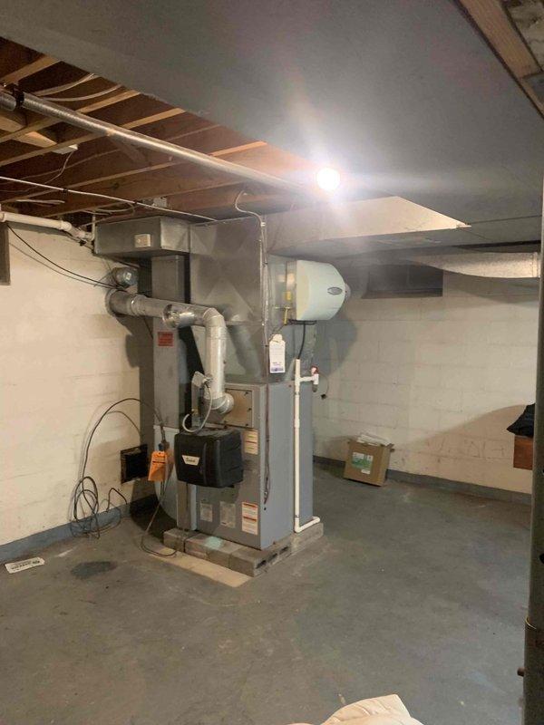 Responded to emergency service call for unusual odor emanating from 10-year-old Bryant furnace system. Upon inspection, identified and assessed gas valve assembly and electrical connections for potential issues causing the reported smell. Examined furnace operation, verified proper combustion, and inspected all mechanical components including flex conduit connections and control modules to ensure system safety and proper functionality.