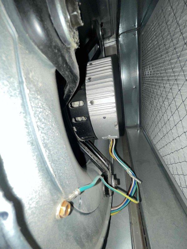 Completed cooling maintenance on air handler unit as part of club membership service. Inspection revealed significant dust and debris accumulation on blower wheel assembly, particularly concentrated around the central hub area, which was cleaned to restore proper airflow and system efficiency. Performed comprehensive system check including examination of electrical connections, control module, and internal components, all of which were found to be functioning within normal parameters.