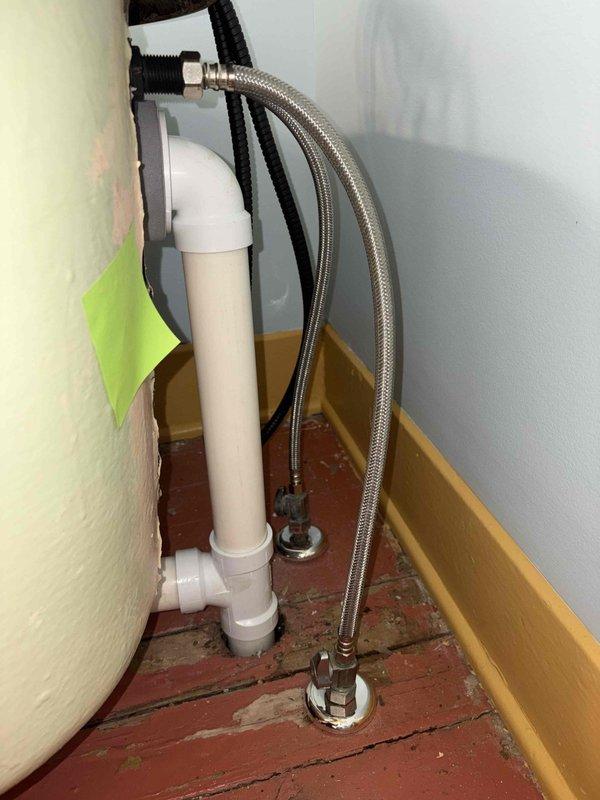 Completed return visit for clawfoot tub faucet installation with new toe tap drain in black finish and body spray fixtures. Materials were previously ordered and received approximately two weeks after initial consultation. Assessed existing plumbing infrastructure including exposed drain lines, copper water supply lines, and shut-off valve locations in basement access area. Verified proper drain and supply line routing through floor joists to accommodate new fixture placement. Inspected installation area including deteriorated flooring surfaces and existing plumbing connections requiring updates to support new clawfoot tub fixtures. Prepared site for installation of black finish toe tap drain assembly and body spray system with compatible supply lines and drainage configuration.