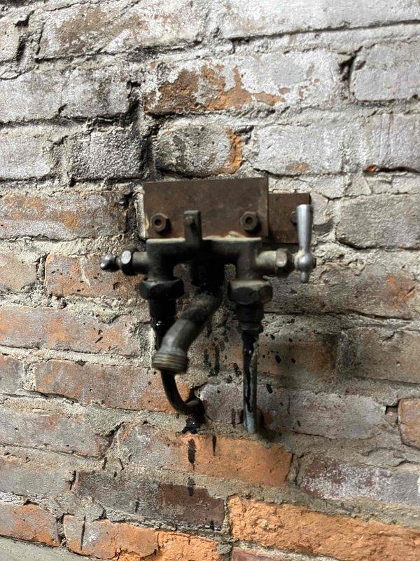Responded to service call for leaky faucet in garage. Upon inspection, identified deteriorated valve assembly with significant corrosion and aging infrastructure. Repaired leak, tested system for proper operation, and confirmed no additional water discharge. Customer provided with service magnet upon completion.