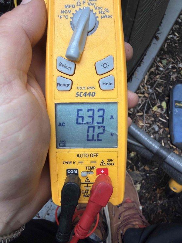 Completed cooling maintenance on two air handler units as part of membership renewal visit. Performed electrical diagnostics using digital multimeter, measuring amperage draw of 6.33A and voltage readings of 242.3V to verify proper system operation. Inspected evaporator coils, which showed clean condition with properly spaced fins and no visible debris accumulation. All components tested within normal operating parameters.