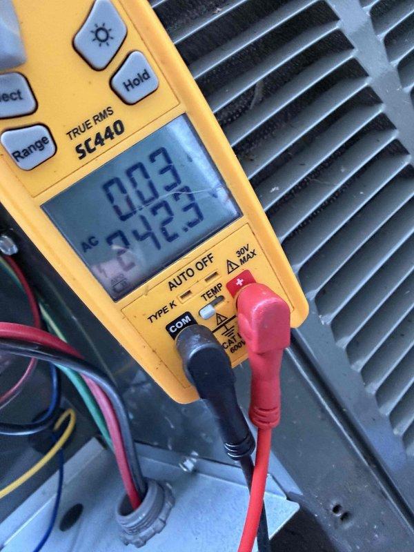 Completed cooling maintenance on two air handler units as part of membership renewal visit. Performed electrical diagnostics using digital multimeter, measuring amperage draw of 6.33A and voltage readings of 242.3V to verify proper system operation. Inspected evaporator coils, which showed clean condition with properly spaced fins and no visible debris accumulation. All components tested within normal operating parameters.