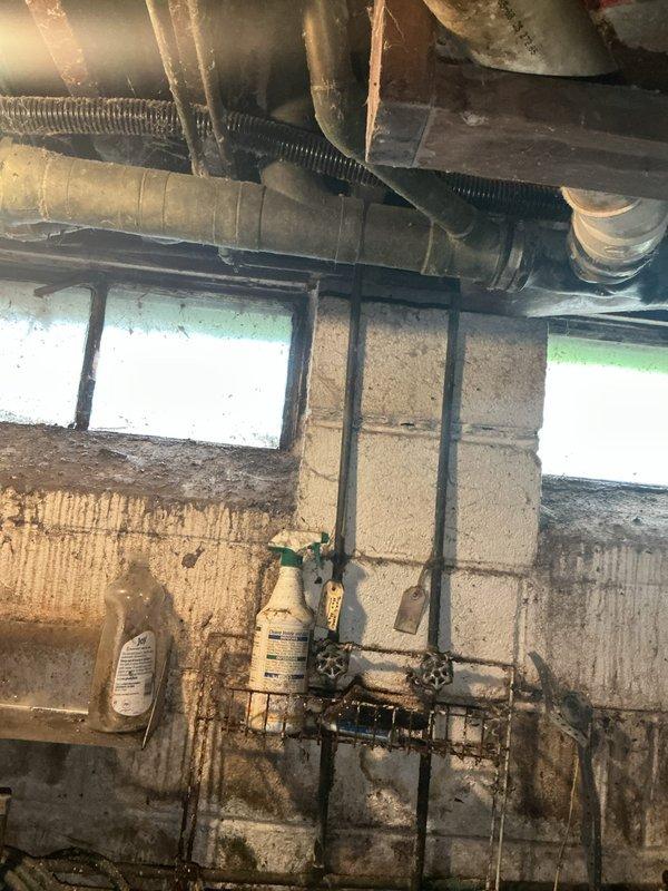 Responded to water leak in basement copper piping system. Upon inspection, identified active leak at copper pipe connection near shut-off valves mounted on foundation wall. Repaired compromised joint, tested system for proper pressure and flow, and verified no additional leaks present. All plumbing fixtures restored to normal operation.