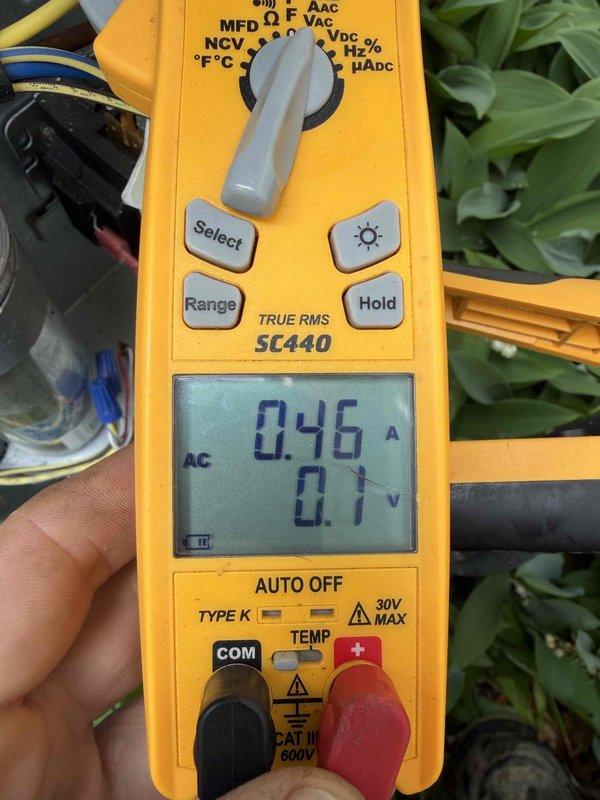 Completed comprehensive tune-up on 11-year-old Lennox air conditioning system. Performed electrical diagnostics using digital multimeter, measuring amperage draw at 0.46A and verifying control voltage at 24.10V AC to ensure proper system operation. All readings within manufacturer specifications, and unit operating efficiently despite previous coil-related issues from earlier service history.