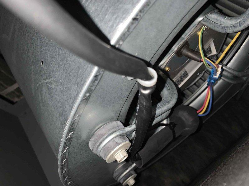 Completed cooling maintenance club visit on residential HVAC system. Performed standard preventive maintenance inspection on air handler unit, including examination of blower motor assembly, electrical connections, and internal ductwork components. All wiring connections at motor terminal block verified secure with proper color-coded conductors present. Blower motor housing and mounting hardware found in good operating condition. Internal duct surfaces inspected and found satisfactory. Customer also noted garage heater requiring attention for future service scheduling.