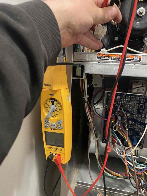 Responded to no-heat call following maintenance visit. Found furnace inoperative with reported hissing sound. Performed diagnostic testing with multimeter on control board, measuring 24V at transformer connections. Identified failed control board as root cause. Removed and replaced defective circuit board assembly, restored proper system operation, and verified all safety controls functioning correctly.
