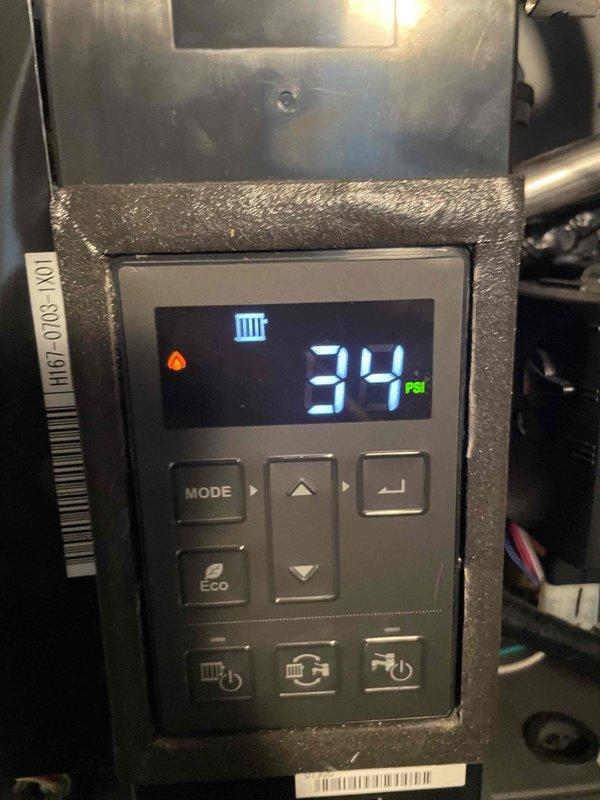 Responded to emergency no-heat call on six-year-old combi boiler displaying E400 and E430 error codes. Diagnosed pressure sensor malfunction likely caused by sediment contamination in the sensor line. Inspected boiler control panel and pressure adjustment valve assembly on copper piping system. Discussed option to run PEX tubing as replacement for existing copper line to resolve ongoing sensor issues and restore heating operation.