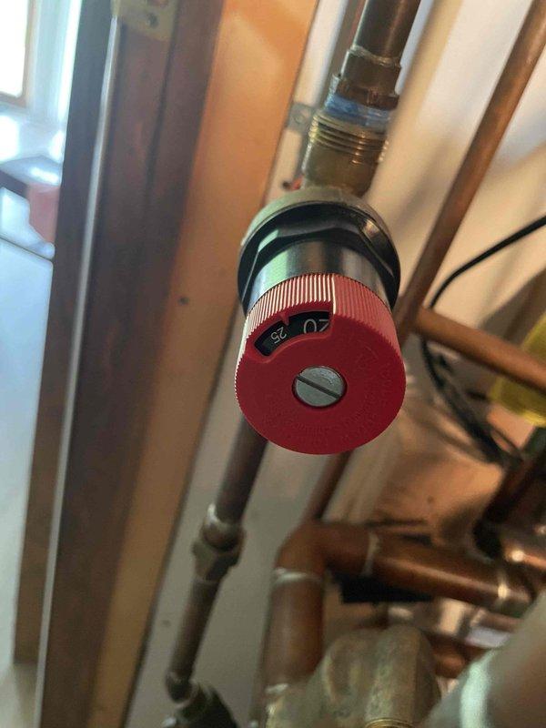 Responded to emergency no-heat call on six-year-old combi boiler displaying E400 and E430 error codes. Diagnosed pressure sensor malfunction likely caused by sediment contamination in the sensor line. Inspected boiler control panel and pressure adjustment valve assembly on copper piping system. Discussed option to run PEX tubing as replacement for existing copper line to resolve ongoing sensor issues and restore heating operation.