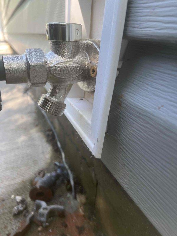 Responded to exterior water pipe leak affecting foundation area. Upon inspection, identified multiple leak points in exterior water line that activated when faucet was opened, causing continuous moisture accumulation along foundation wall. Performed necessary repairs to damaged pipe sections to eliminate all active leaks. Replaced existing exterior hose bibs with new frost-proof sillcocks featuring improved quarter-turn operation, addressing customer concerns about difficulty operating previous fixtures. Tested all connections under full water pressure to verify leak-free operation and proper drainage.