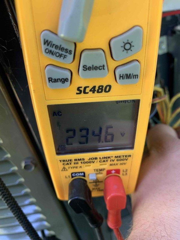 Completed cooling maintenance on two air handlers per club membership agreement. Performed comprehensive system inspection including electrical testing with digital multimeter, confirming voltage readings at 234.6V within acceptable parameters. Inspected wall-mounted HVAC unit and associated water heating equipment, verifying proper operation of digital controls and system components. Documented equipment condition through photographs for service records. All systems operating within normal specifications upon completion of maintenance visit.
