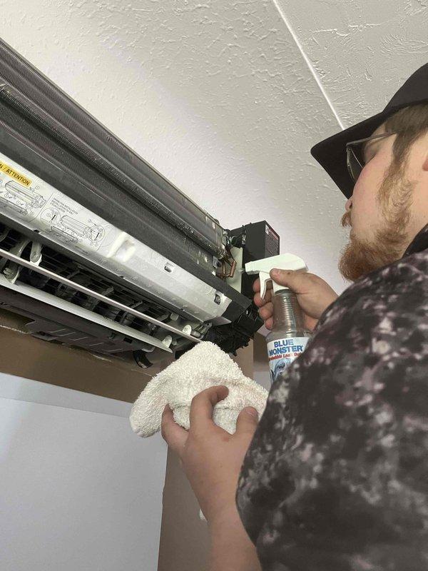 Performed comprehensive refrigerant leak detection on ductless mini-split system by pressurizing system to 50 PSI and applying leak detection solution to all connections, indoor unit, and outdoor unit components. Extended pressure test conducted to verify system integrity, with particular attention to copper line connections and evaporator assembly where cover was removed for thorough inspection.