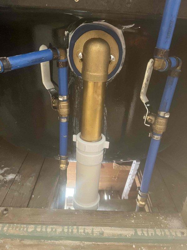 Responded to callback for bathtub overflow assembly with deteriorating caulking. Removed and replaced overflow cover plate, installed new rubber gasket and plumber's putty around drain fitting to ensure proper seal. Verified water-tight connection and inspected under-floor plumbing assembly including PEX supply lines and shut-off valves for any related leaks or issues.