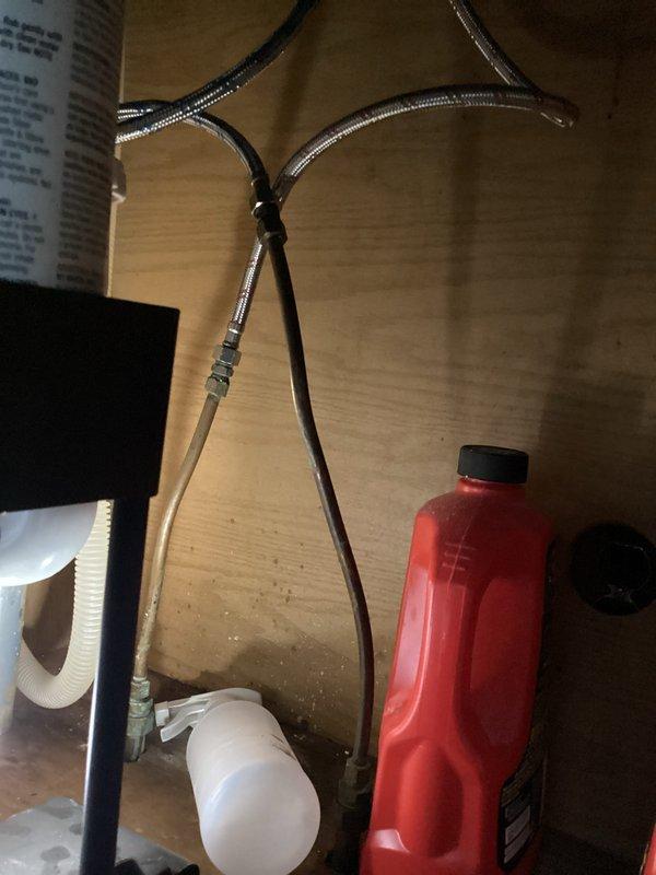 Performed routine maintenance flush on tanked water heater to remove sediment buildup and maintain optimal heating efficiency. Connected drain hose to tank drain valve, flushed system until water ran clear, and verified all connections were secure upon completion.