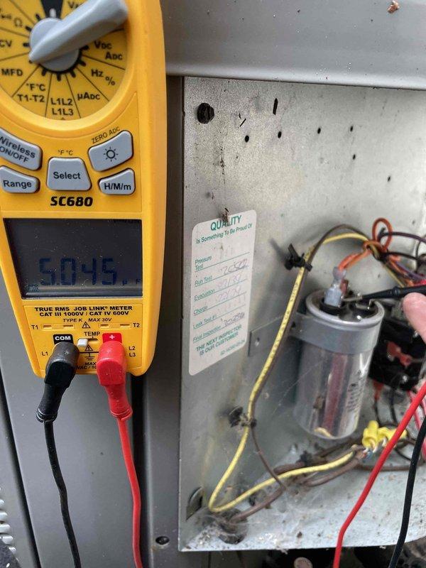 Completed routine cooling maintenance member visit on residential HVAC system. Performed comprehensive inspection of air handling unit, including detailed examination of blower motor assembly and squirrel cage fan. Verified proper motor operation and mounting integrity. Conducted electrical diagnostics using digital multimeter, measuring capacitor performance and electrical values to ensure system operates within manufacturer specifications. All components found functioning properly with readings within acceptable parameters. System operational and ready for continued service.