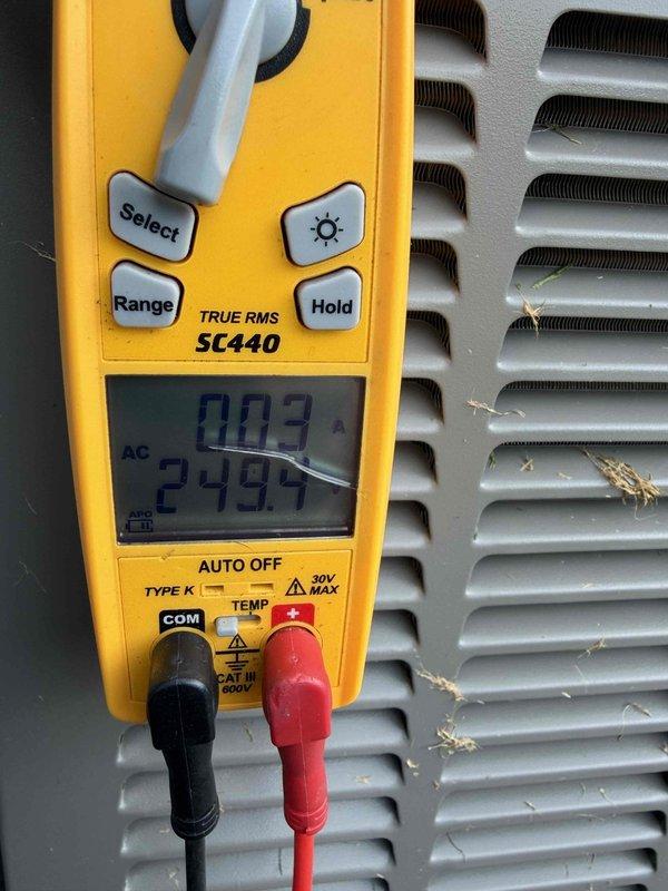 Completed scheduled cooling maintenance member visit on HVAC system. Performed diagnostic measurements using digital multimeter, recording voltage reading of 249.4V AC and amperage draw of 10.22A to verify proper electrical operation and system performance. Unit operating within normal parameters with no issues identified during inspection.