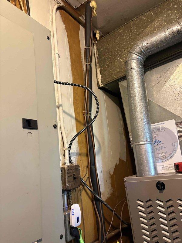 Conducted on-site evaluation of existing HVAC system in basement mechanical room to provide replacement options. Assessed current furnace/air handler unit, ductwork configuration including galvanized metal trunk lines and elbow transitions, electrical panel connections, and overall system layout. Documented equipment conditions and spatial constraints through photographic records. Prepared comprehensive replacement estimate with equipment options suitable for the existing infrastructure and installation requirements.