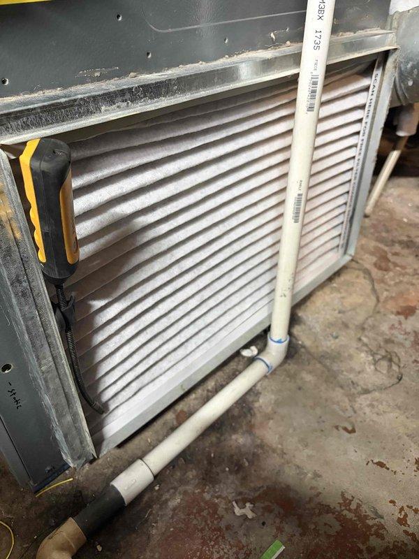 Completed routine cooling maintenance for club member. Performed comprehensive inspection of HVAC system including indoor air handling unit with evaporator coils and outdoor condensing unit. Inspected evaporator coil fins for dust accumulation and airflow restrictions, verified system components are operating within normal parameters. Checked electrical disconnect and fuses at outdoor unit, confirmed proper amperage ratings and secure connections at copper bus bars and terminals. All equipment showing normal operational wear consistent with regular use. System operating efficiently with no immediate service needs identified.