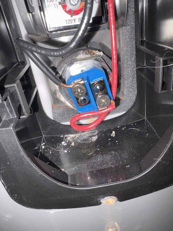 Responded to service call for leaking pipe at electric water heater and broken kitchen faucet. Inspected 50-gallon electric water heater and identified leak at water supply connection. Repaired leaking pipe at water heater inlet. Addressed malfunctioning kitchen faucet with broken internal components and debris accumulation in basin. Inspected electrical connections at water heater terminal block, verified proper wiring of hot and cold leads, and confirmed temperature settings within safe operating parameters. All repairs completed and systems tested for proper operation.
