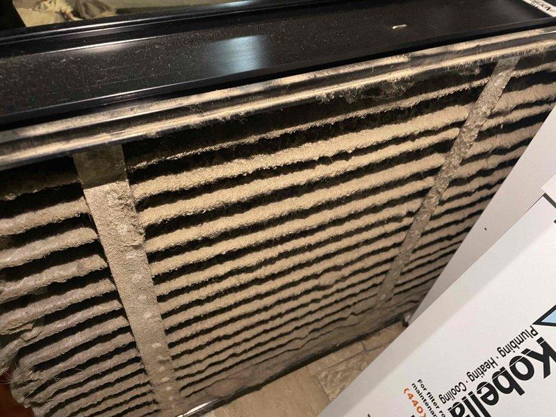 Responded to no-cooling complaint on residential HVAC system installed two years ago. Upon arrival, confirmed no airflow from supply vents and indoor temperature reading 76°F with thermostat set to 70°F. Diagnosed control board failure indicated by "dL" error code displayed on Emerson circuit board LED. Replaced defective control board (part number 59M47-096-01) and verified all wire connections to terminals. Inspected evaporator coil and found heavy dust and debris accumulation on fins restricting airflow. Performed thorough coil cleaning to restore proper heat exchange efficiency. Cycled system through complete operational test, confirmed proper cooling cycle engagement, verified adequate airflow at all registers, and ensured thermostat communication with new control board. System restored to full functionality.