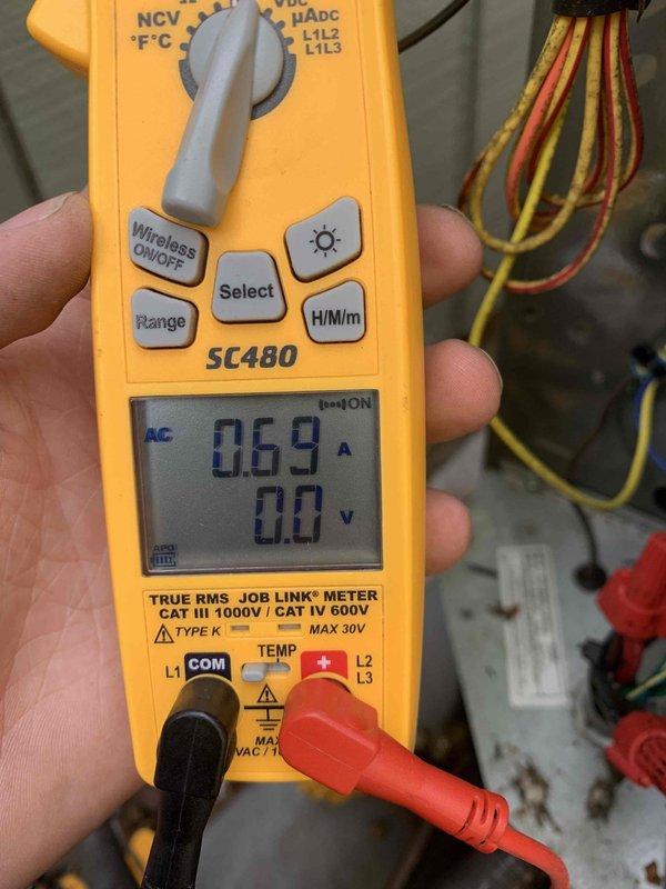 Completed prepaid cooling maintenance visit on air handler system. Performed temperature diagnostics using digital multimeter, recording supply air temperature of 50.66°F and verified electrical current draw of 0.69A with 0.0V at time of measurement. Conducted standard club maintenance inspection with photo documentation of system performance and electrical measurements to confirm proper operation of cooling equipment.