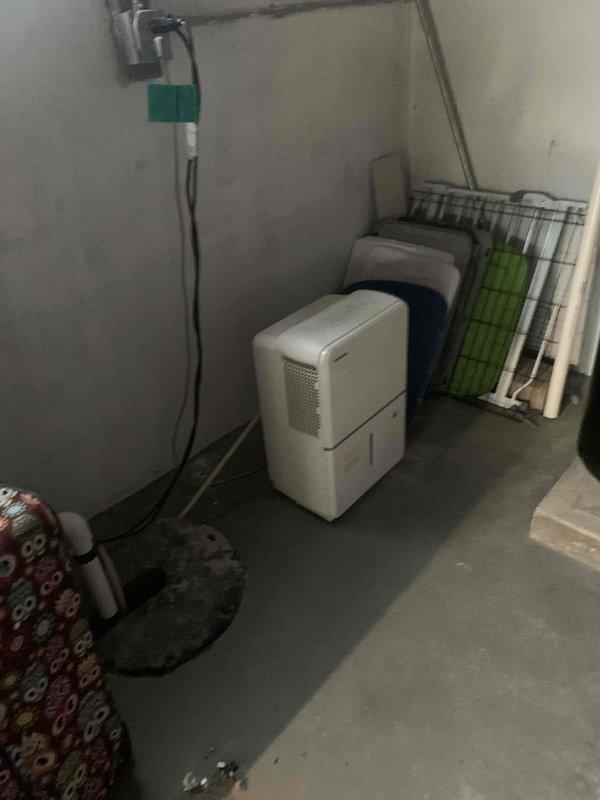 Completed cooling maintenance club member visit. Performed system diagnostics and electrical measurements on HVAC equipment, recording voltage readings of 240V using calibrated digital multimeter. Inspected basement mechanical room including dehumidifier unit operation and condensate pump assembly with discharge piping. All equipment operating within normal parameters and accessible for service.