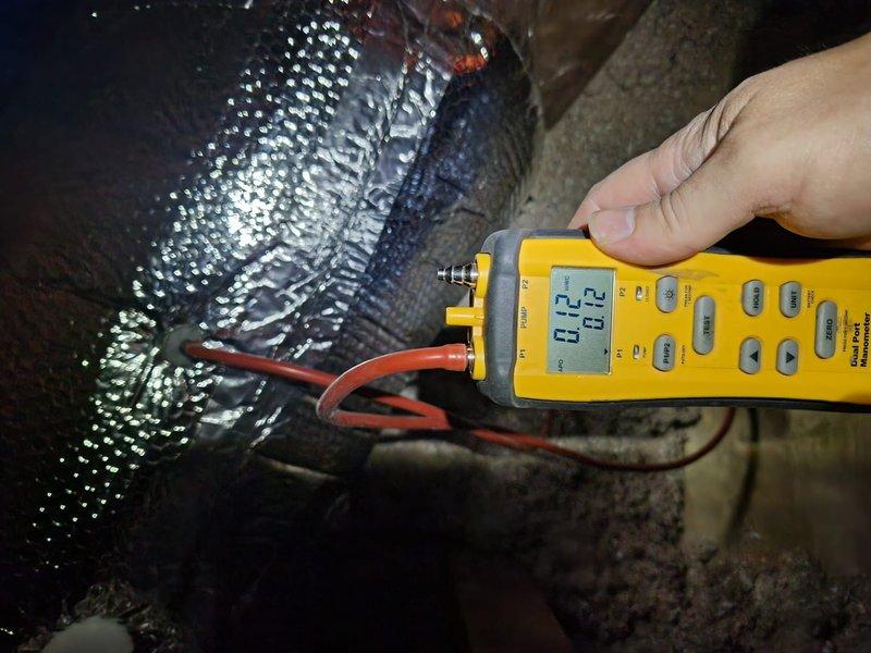 Completed system start-up procedures for newly installed HVAC equipment. Performed refrigerant line temperature measurements on copper suction lines, recording 40.3°F at the evaporator coil connection point to verify proper system operation and refrigerant flow. Conducted electrical diagnostics on flexible ductwork connections using digital multimeter to ensure proper voltage and system functionality. Installed 24x24 return air grille to complete the air distribution system. System charge verification will need to be rechecked during warmer ambient conditions to ensure optimal refrigerant levels and confirm proper subcooling and superheat readings per manufacturer specifications.