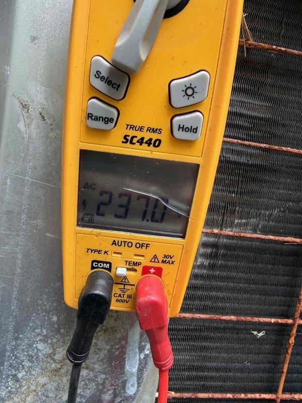 Completed final prepaid club maintenance visit on air handler system. Replaced dirty air filter with new unit, verified proper airflow and system operation. Performed electrical diagnostics using multimeter, confirmed voltage readings at 23.7V within normal operating parameters for control circuit.