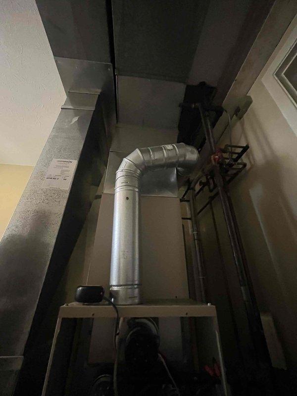 Conducted comprehensive HVAC system evaluation for complete replacement estimate. Assessed existing air conditioning system reported to be losing refrigerant with obsolete coolant type no longer commercially available. Documented mechanical closet installation including main HVAC unit, supply and return ductwork configuration, and associated electrical service panel. Photographed equipment nameplate data, ductwork routing with elbow transitions, refrigerant line sets with valve fittings, and electrical breaker panel showing dedicated HVAC circuit capacity. Evaluated utility space accessibility for equipment removal and new system installation. Provided detailed replacement recommendations based on current system age, refrigerant obsolescence, and operational failure.