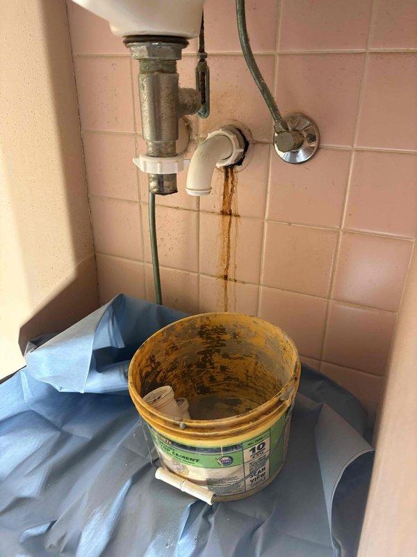 Responded to service call for slow-draining bathroom sink and frequently clogging toilet. Upon inspection, removed and cleaned drain trap assembly, extracting accumulated debris, hair, and sediment that had restricted water flow. Cleared blockage from drain line, tested drainage system to confirm proper flow restoration, and verified toilet operation returned to normal function.