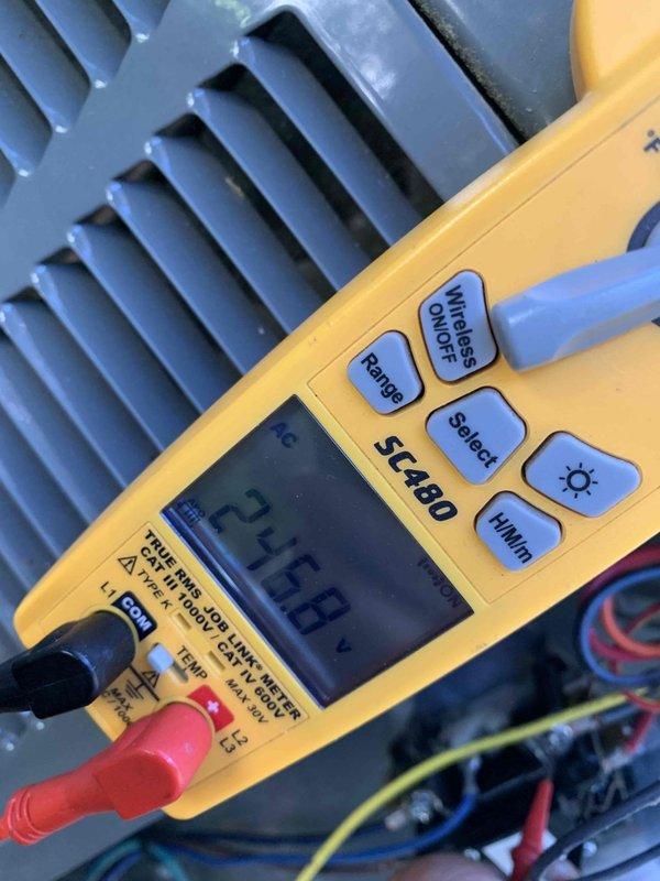 Completed comprehensive AC tune-up on 20-year-old cooling system for recent homeowner. Performed full system diagnostics including electrical measurements with multimeter, verified amp draw and voltage readings within acceptable parameters, and inspected condenser coil condition. All components operating properly with no immediate concerns identified; customer expressed interest in enrolling in ongoing maintenance program for continued system reliability.