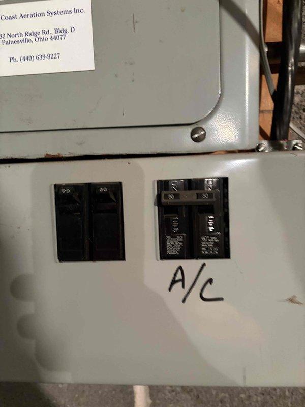 Completed estimate for replacement of 38-year-old residential air conditioning system that has reached end of serviceable life. Assessed existing outdoor condensing unit showing significant age-related deterioration, weathering, and vegetation encroachment requiring clearance for proper airflow. Evaluated electrical service including dedicated 30-amp breaker circuit and documented current system configuration to determine appropriate replacement specifications.