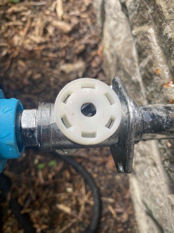 Responded to service call for bathroom leak affecting basement and two non-functional exterior spigots. Inspected outdoor hose bibs and identified failed valve cartridges in both units, with one spigot showing complete internal component deterioration. Replaced defective valve stems and cartridges on both exterior spigots, restoring proper operation and eliminating water seepage at ground level. Addressed bathroom plumbing issue causing basement water intrusion and verified all repairs for proper function and leak-free operation.