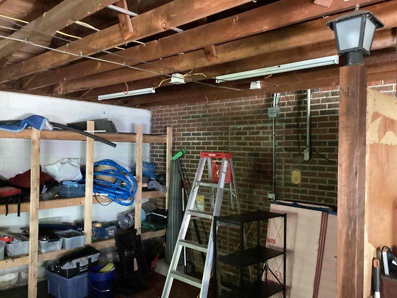 Completed estimate for mini-split installation in lower level basement area. Assessed electrical panel capacity and determined suitable location for new dedicated circuit breaker, evaluated unfinished basement space with exposed joists and brick walls for optimal indoor unit placement and refrigerant line routing.