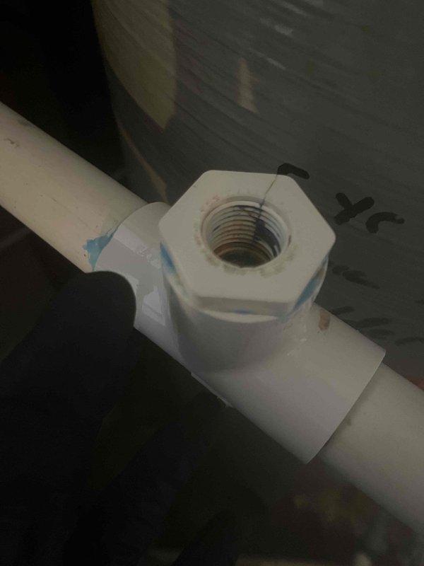 Responded to service call for non-company equipment experiencing chlorinator leak and pump malfunction. Inspected PVC plumbing connections and water treatment system components, documented existing conditions including leaking chlorinator fitting and compromised pump operation. Assessed dehumidifier unit in basement area as part of overall water management system evaluation.