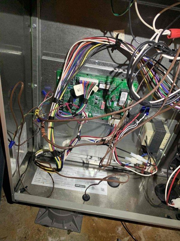 Responded to no communication between thermostat and air handler. Upon arrival, inspected zone control system and circuit boards within the air handler cabinet. Found communication failure between thermostat and zone control board. Verified all wire connections at terminal blocks and traced low-voltage wiring throughout the system. Reset zone control panel, cycled power to the unit, and restored proper communication protocol between thermostat and air handler. Tested system operation through multiple heating cycles to confirm thermostat commands were being received and executed properly by the equipment. System now operating normally with full thermostat control restored.