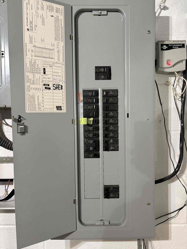 Completed estimate for replacement of 36-year-old air conditioning system serving dual-zone residential application with single outdoor condenser unit supplying both upstairs and downstairs air handlers. Documented existing electrical panel configuration showing dedicated circuits for both air handler units. Provided replacement options and recommendations for upgrading aging HVAC system to improve efficiency and reliability.