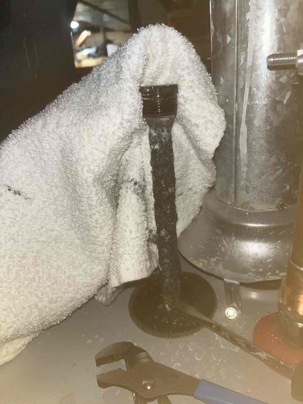 Performed complete tank flush on A.O. Smith water heater to address manganese contamination in the water supply. Drained sediment from tank, inspected anode rod condition, and sanitized the system to eliminate mineral buildup and improve water quality. All plumbing connections were checked for leaks during the refill process, and the unit was returned to normal operation.