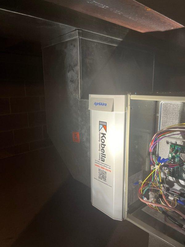 Completed full HVAC system installation including air handler unit with integrated ductwork and AprilAire air purification system. Installed and wired electrical control panel with proper color-coded connections, mounted all equipment in attic space, and verified system operation with digital diagnostic measurements showing proper superheat readings and system parameters within manufacturer specifications.