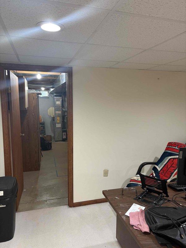 Performed comprehensive assessment of existing HVAC system installed in 1999 requiring replacement. Evaluated current air conditioning unit, electrical control panel components, and overall system condition in basement installation location. Documented equipment specifications, wiring configurations, and existing infrastructure to prepare detailed replacement estimate for new air conditioning system.