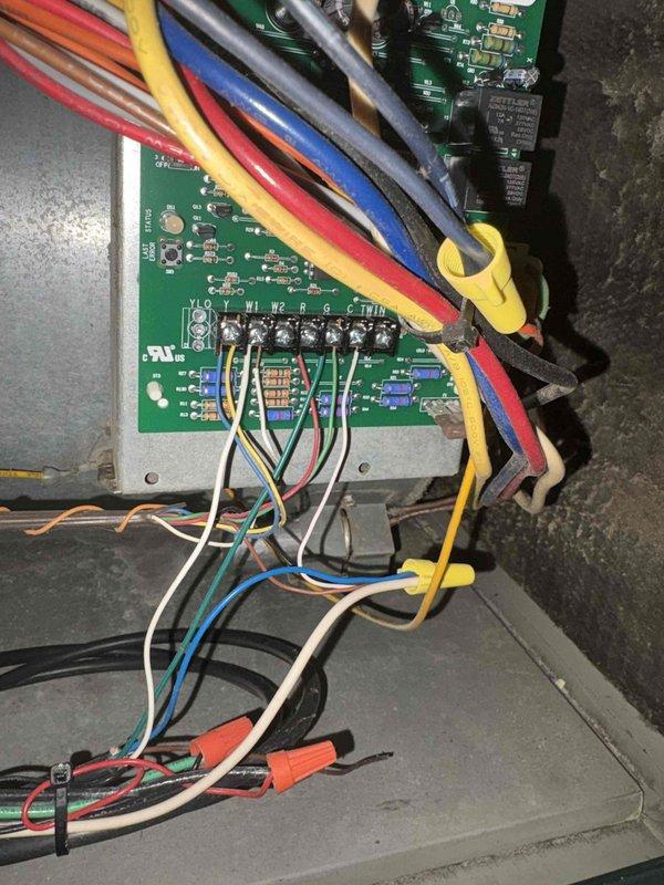 Performed comprehensive assessment of existing HVAC system installed in 1999 requiring replacement. Evaluated current air conditioning unit, electrical control panel components, and overall system condition in basement installation location. Documented equipment specifications, wiring configurations, and existing infrastructure to prepare detailed replacement estimate for new air conditioning system.