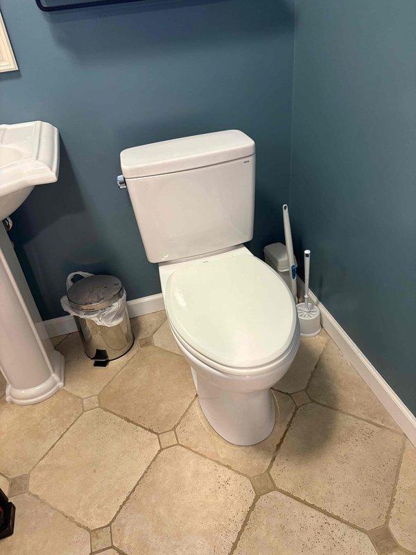 Responded to clogged garbage disposal and kitchen sink. Upon inspection, found blockage in the disposal unit and drain line. Cleared obstruction from disposal grinding chamber and flushed P-trap assembly to restore proper drainage. Tested disposal operation and verified water flow through sink drain with no leaks detected at connections.