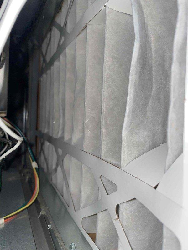 Completed routine cooling maintenance member visit on HVAC system. Inspected and verified clean pleated air filter condition within air handling unit, checked electrical connections and wiring integrity, and performed diagnostic voltage measurements reading 34.0V using calibrated multimeter to ensure proper system operation and performance.