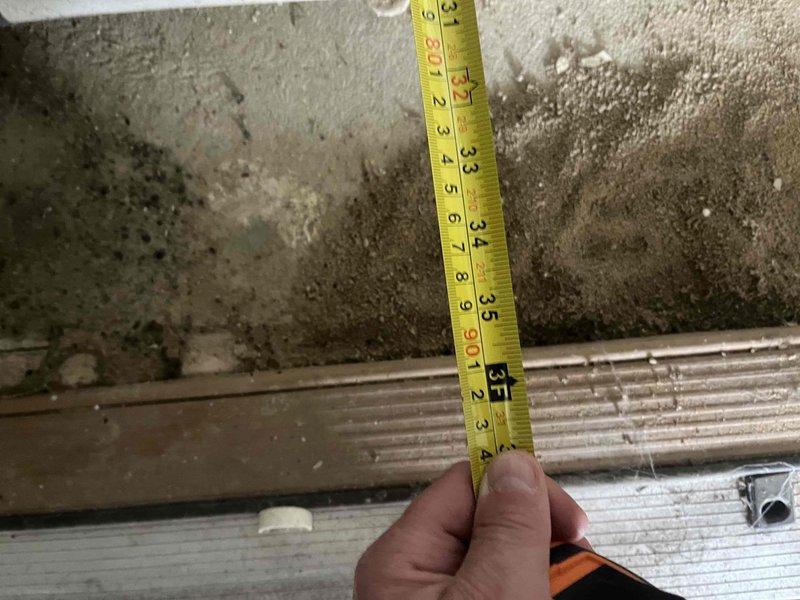 Conducted comprehensive HVAC replacement estimate for a 22-year-old air conditioning system that is currently non-operational. Assessed existing equipment configuration in mechanical room, including air handler unit and associated ductwork showing moisture accumulation. Documented equipment clearances and measured vertical space constraints in utility area to determine replacement unit specifications and installation requirements for new HVAC system.