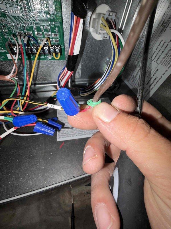 Responded to no cooling call on newer system where indoor fan was operating but compressor failed to energize. Diagnosed and repaired faulty wire connection at control board that was preventing compressor contactor from receiving proper signal. Verified all low voltage wiring connections, secured loose wire nuts, and tested system operation to confirm compressor now running and unit cooling properly.